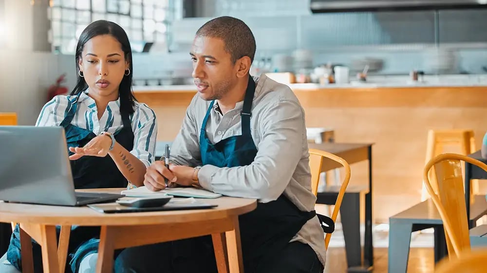 staff sitting in restaurant
